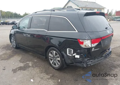 2016 Honda Odyssey Touring/Touring Elite z USA, uszkodzony, nr VIN 5FNRL5H9XGB054870